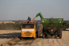 A Kamaz PJSC truck Acros combine harvesters, manufactured by Rostselmash OJSC, during the summer wheat harvest on a farm operated by 'Svetlyi" Group of Companies, in Kamenka village, outside Rostov, Russia, July 5, 2019. http://gk-svetlyi.ru/