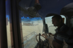 Acros combine harvesters, manufactured by Rostselmash OJSC, during the summer wheat harvest on a farm operated by 'Svetlyi" Group of Companies, in Kamenka village, outside Rostov, Russia, July 5, 2019. http://gk-svetlyi.ru/